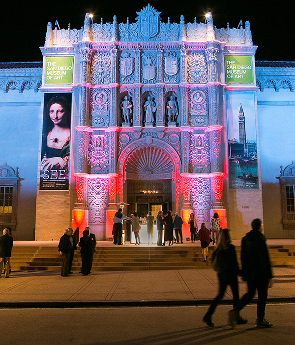San Diego Museum of Art entrance colorfully lit up at night