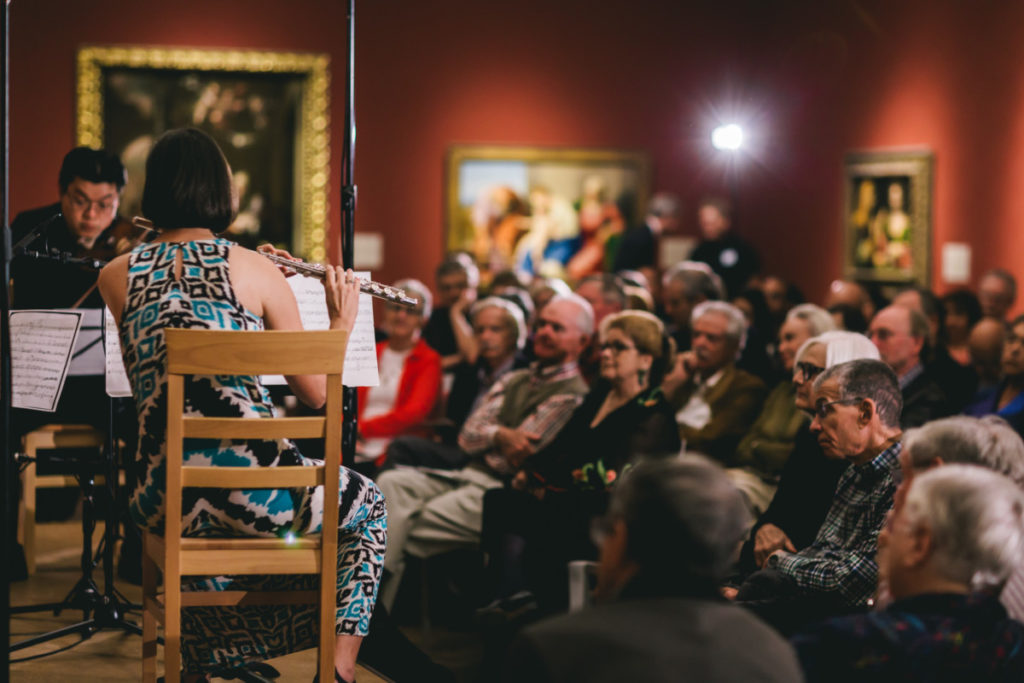 Art of Elan performing inside The San Diego Museum of Art with live seated audience