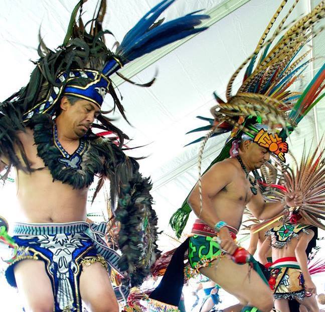 Danza Mexi'cayotl dancers performing in traditional garb