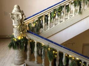 Rotunda stairs decorated with holiday garland