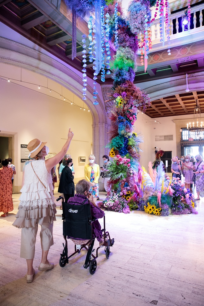 Two people inside The San Diego Museum of Art rotunda during Art Alive 2021