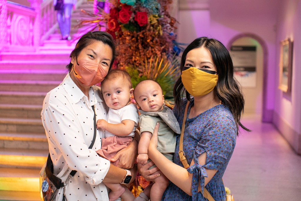 Two women wearing face masks with young children at The San Diego Museum of Art's 2021 Art Alive