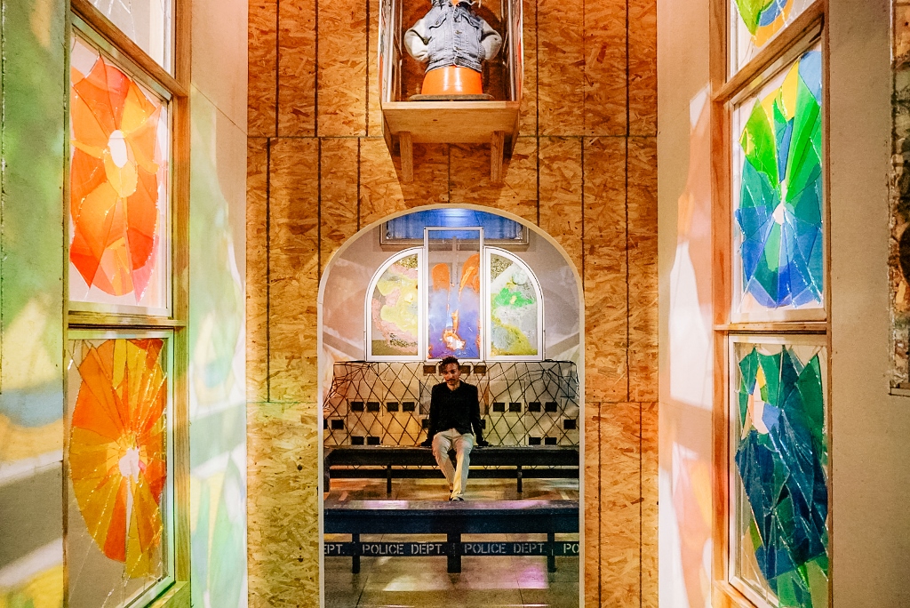 Artist Justin Sterling inside his Chapel of the Rocks installation at The San Diego Museum of Art, 2022