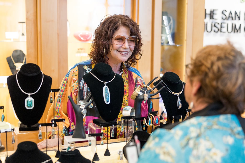 Sheri Liebert interacting with customer