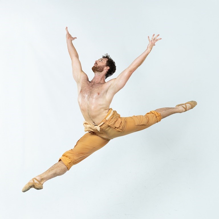 Male ballet dancer leaping
