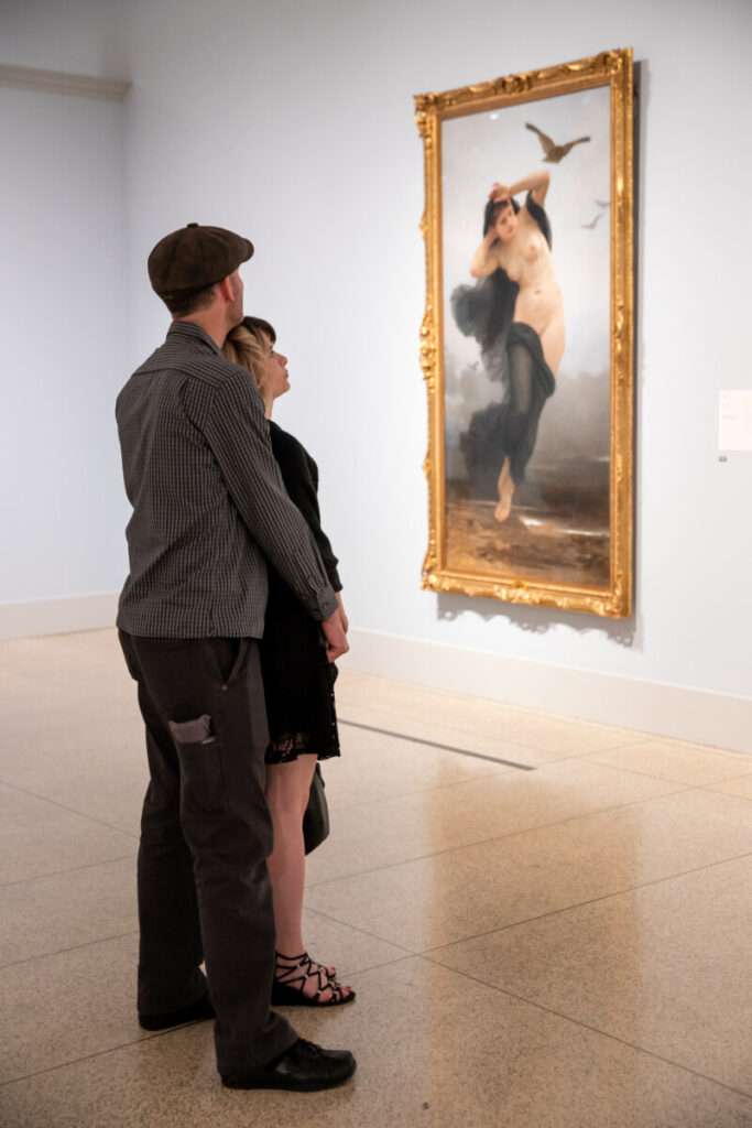couple looking at art