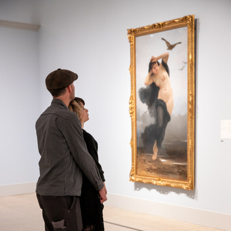 couple looking at art