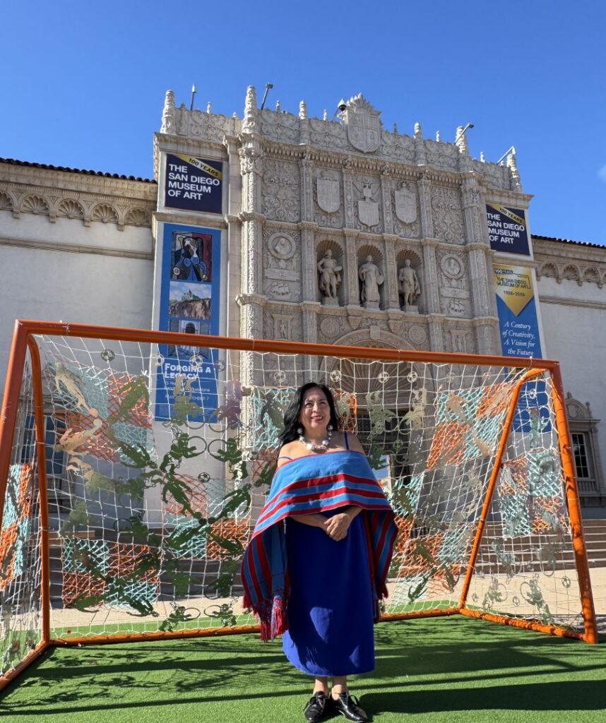 Betsabeé Romero in front of The San Diego Museum of Art